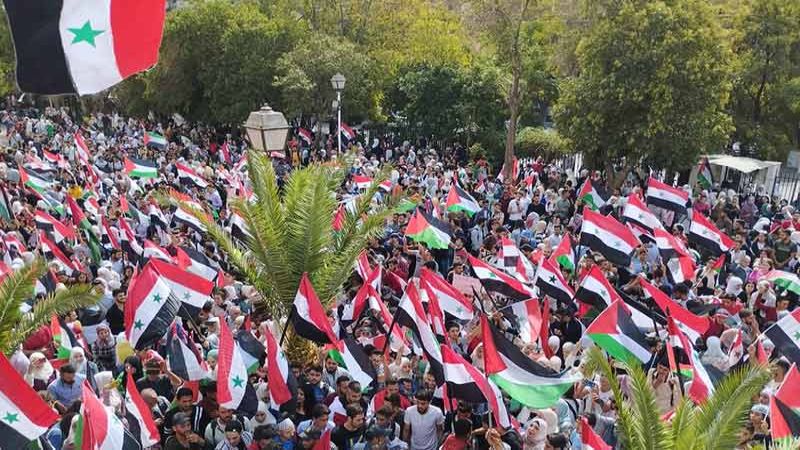 جامعة دمشق تحتفي بالمقاومين الفلسطينيين وطوفان الأقصى